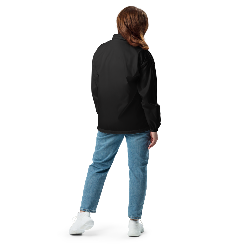 Persona de pie de espaldas usando Cortavientos Negro Unisex VOOM — The Motion Code con diseño impermeable y corte relajado.