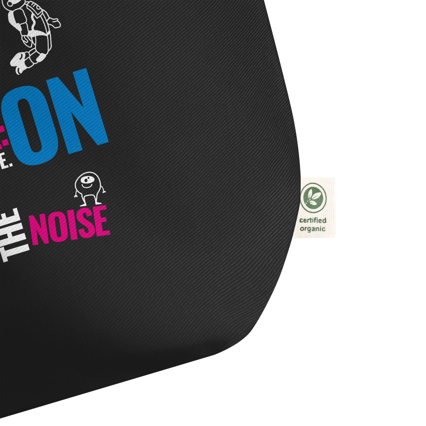 Detalle del tejido de algodón orgánico con etiqueta certificada de la Ecobolsa VOOM “Human Mode: ON”