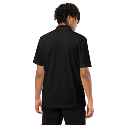 Persona de espaldas usando Polo Negro VOOM x adidas — The Discipline Code, con corte deportivo y tejido transpirable.