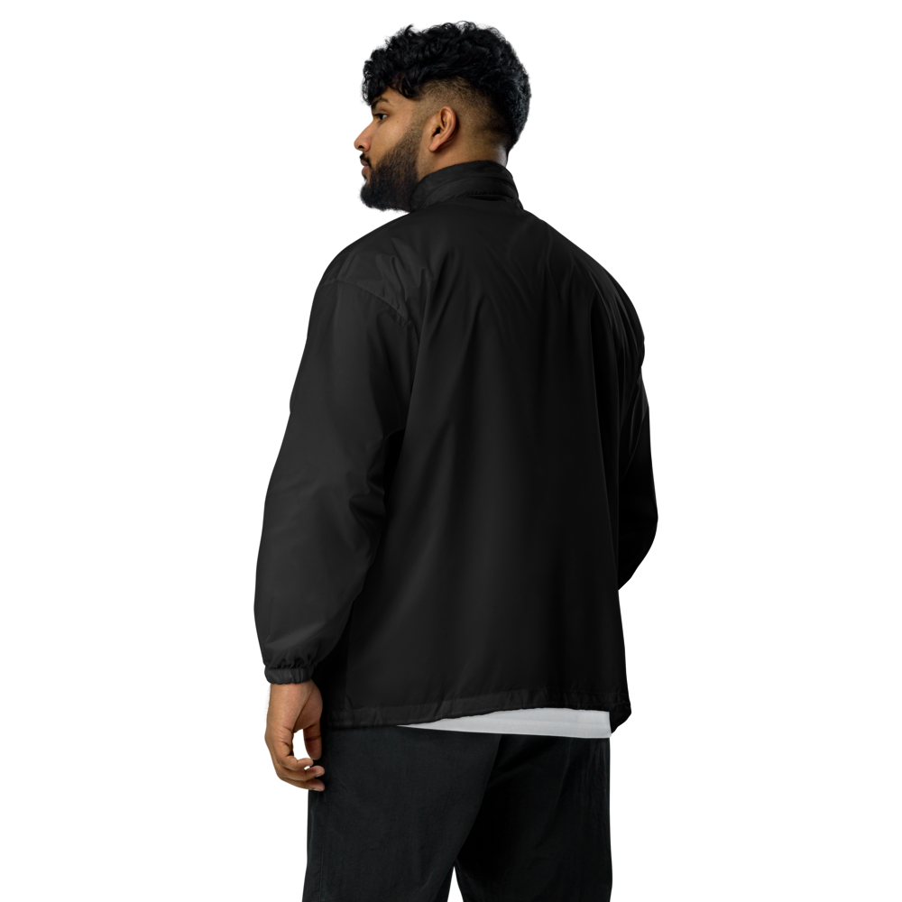 Hombre de espaldas vistiendo el Cortavientos Negro Unisex VOOM — The Motion Code con corte clásico y ajuste relajado