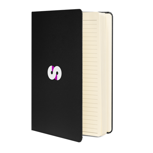 Cuaderno de Tapa Dura VOOM — The Archive Code con cubierta UltraHyde negra, logo central blanco y púrpura, páginas crema rayadas abiertas.